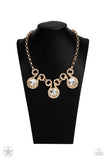 Hypnotized - Gold Bling Necklace Paparrazi Accessories