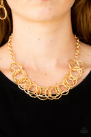 Heavy Metal Hero - Gold Ring Necklace Paparazzi Accessories