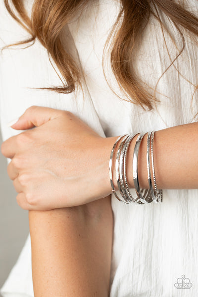 Top Of The Heap - Silver 7 bangles Bracelets Paparrazi Accessories